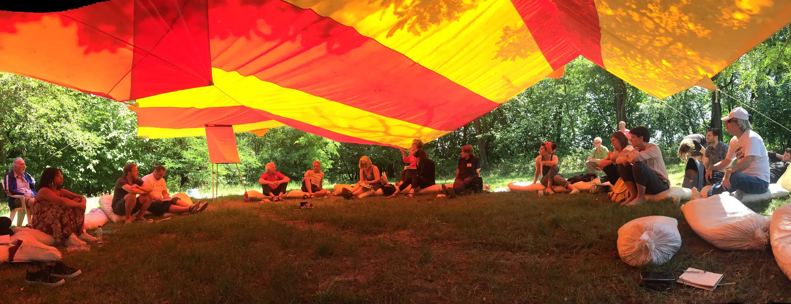 Students under a giant umbrella