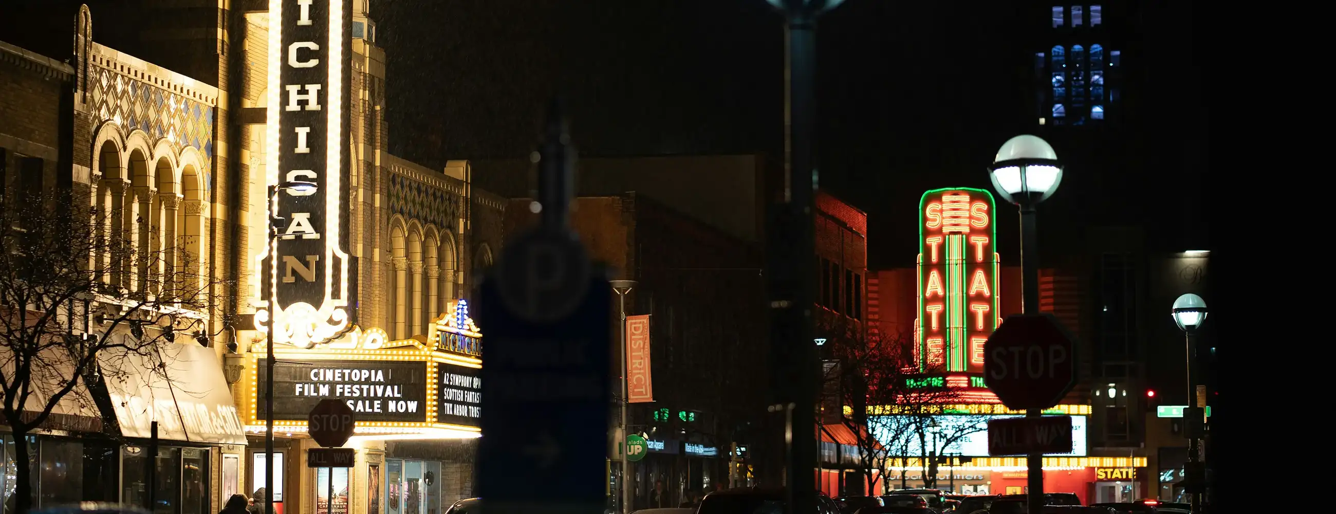 Photo of the Michigan and State Theaters in Ann Arbor at night.