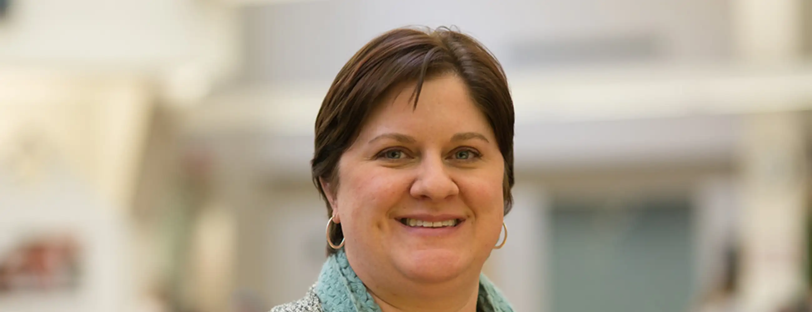 Photo of Hollie Bellamy-Rodgers in the School of Social Work atrium.
