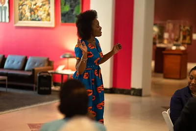 A person speaking to a room