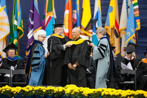 Dr. Curtis at a U-M commencement receiving an honorary doctorate.