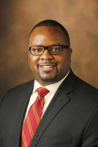 Derek M Griffith