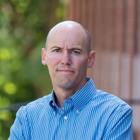 Justin E. Heinze