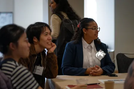 Students listening at a recent doctoral recruitment event.